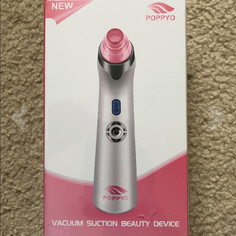 Vacuum pore beauty device